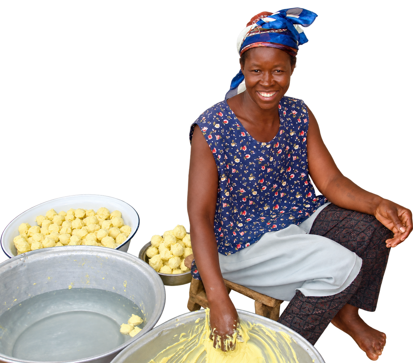 A Baraka producer shaping shea butter by hand