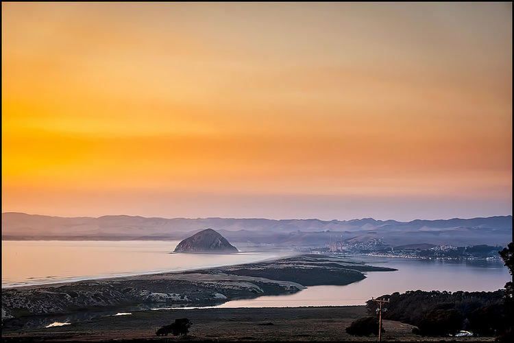 Morro Rock rising beside Morro Bay