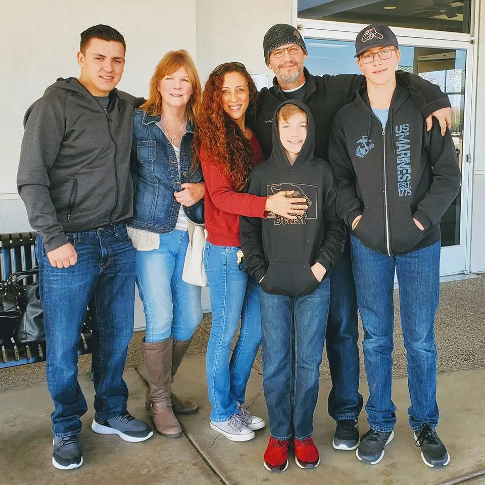 Karen with Andie, Greg, and family together