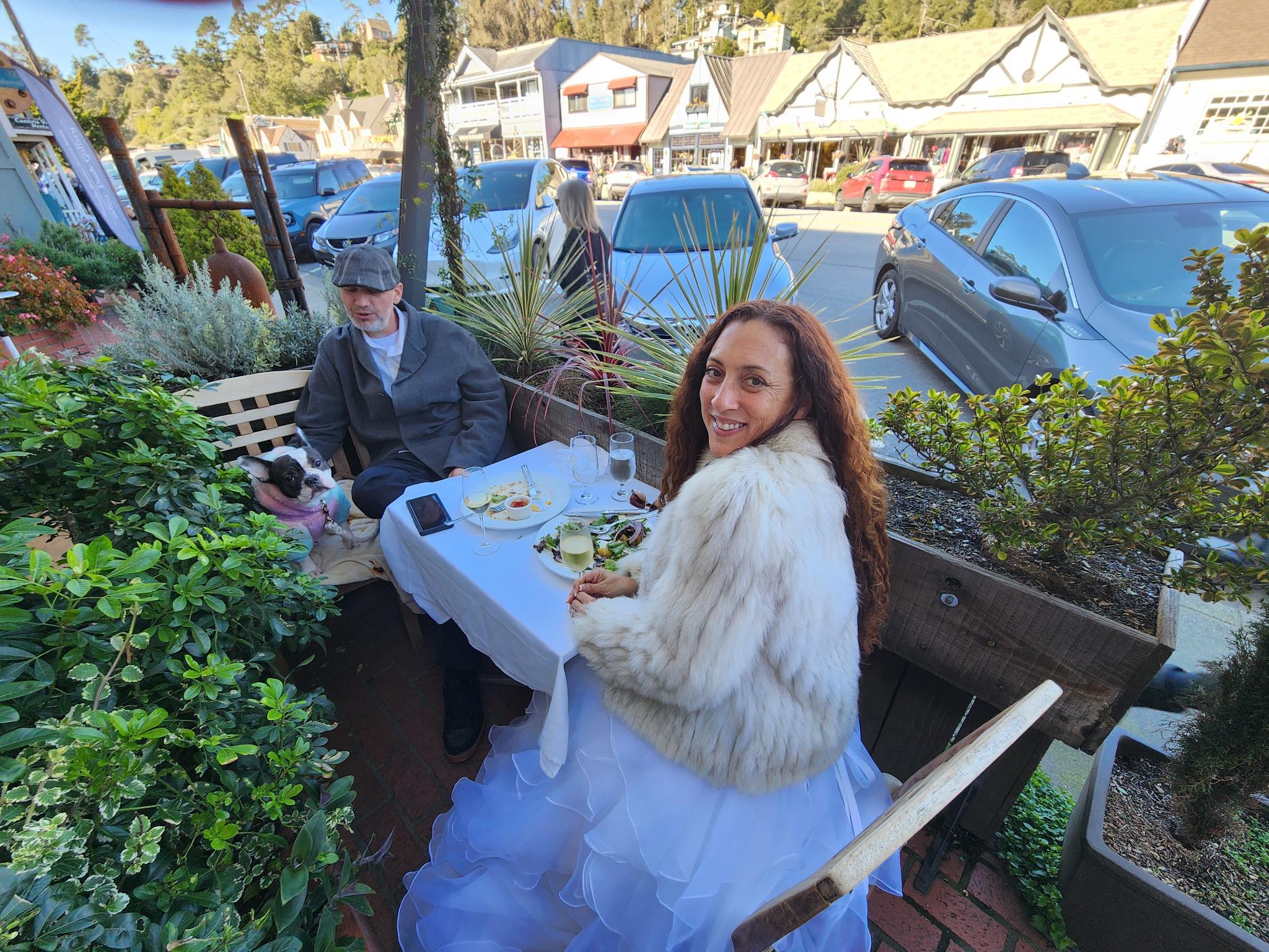 Andie and Gregory at their wedding dinner on the Main Street patio at Madeline’s