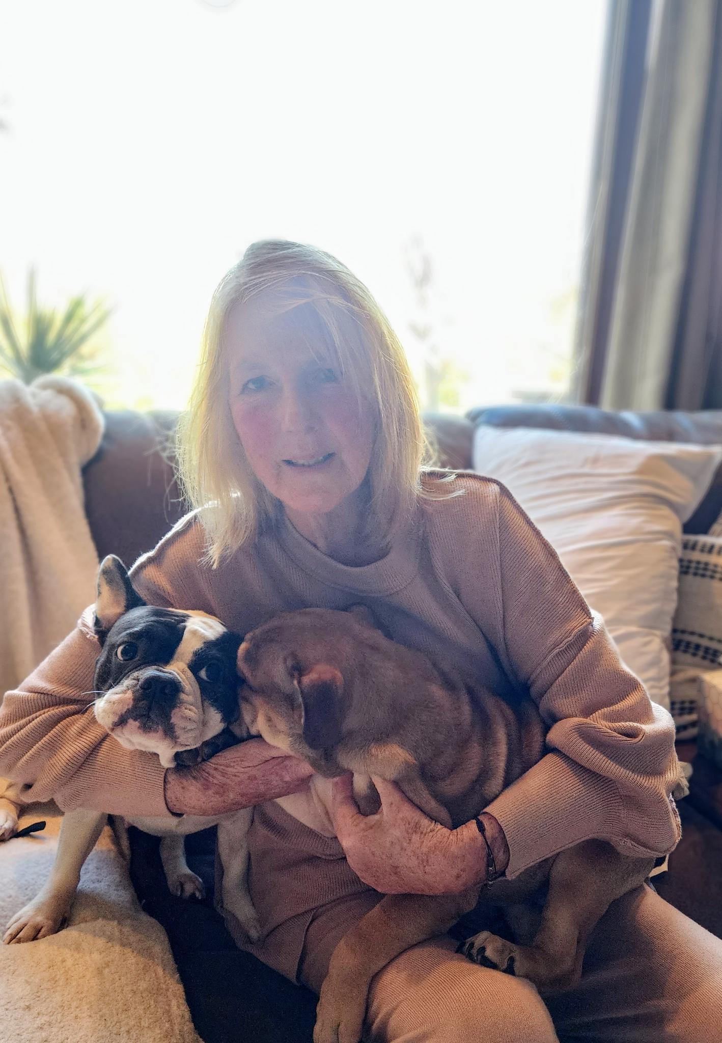 Andie’s mama holding dogs close to her