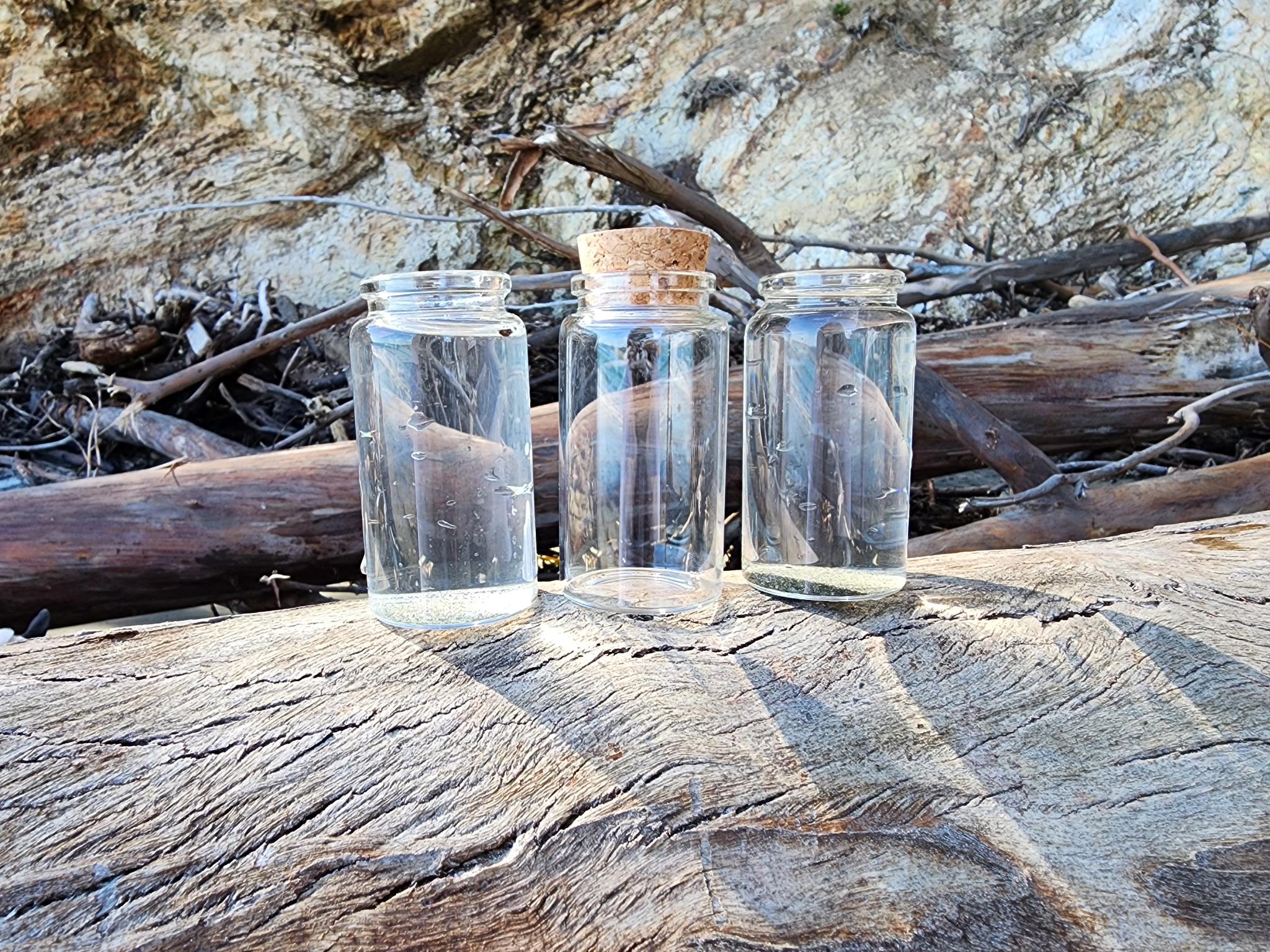 The jars of water and sand we filled to represent our moms