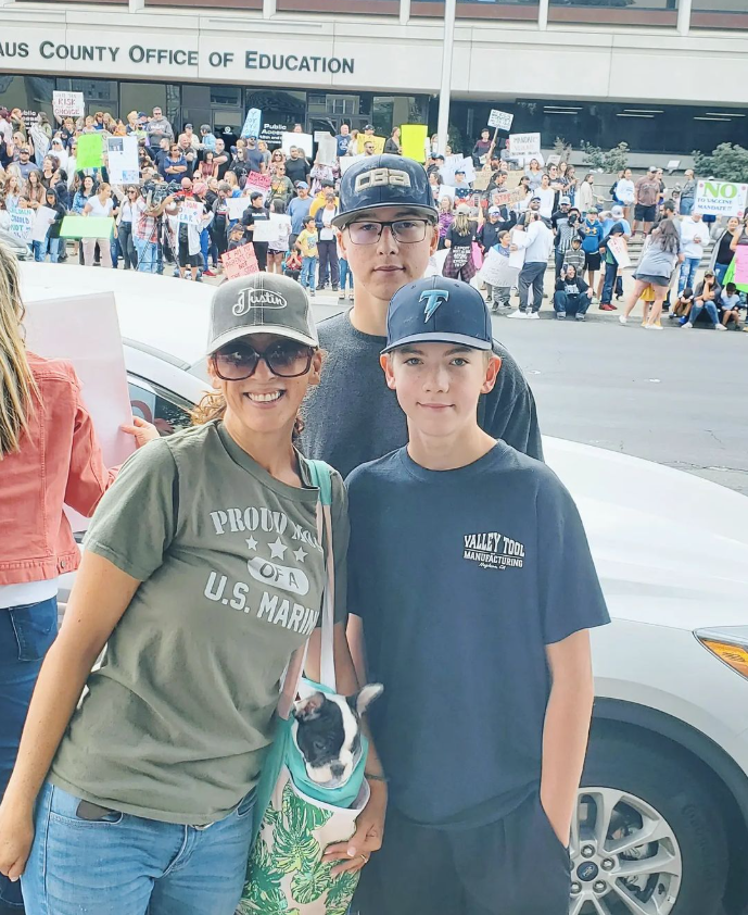 Andie with her sons at a family-choice gathering
