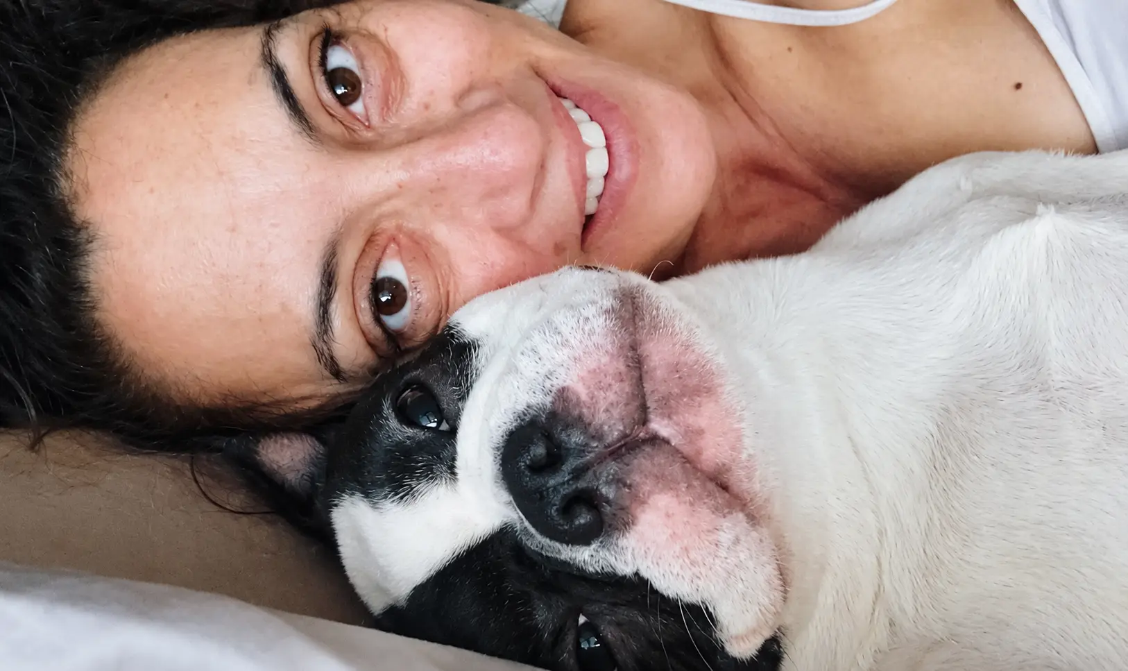 Andie resting cheek-to-cheek with Piper